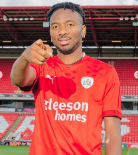 Cut above the rest: Nwakali scores first goal in Barnsley colours but taken off with suspected injury