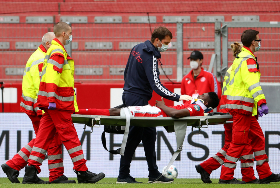 Photo : Liverpool Loanee Awoniyi Rushed To The Hospital After Clash Of Heads With Augsburg's Uduokhai