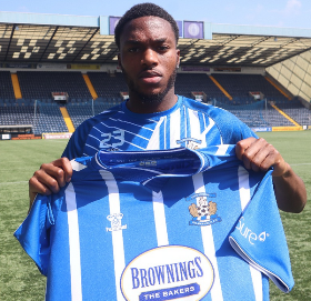 Irish-Nigerian winger, once registered as Man Utd's fastest player, joins Kilmarnock on loan