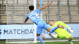Nigeria-eligible winger reacts after scoring 18 minutes into his senior debut for Man City