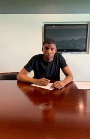 Photo : 6ft 4in Nigerian Defender Inks New Two-Year Deal With Morecambe 