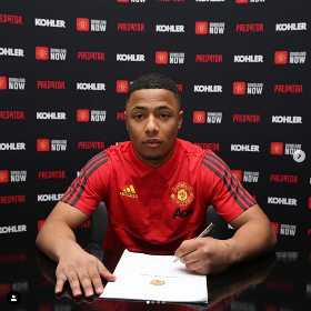 (Photo) Promising Nigerian Striker Signs New Deal With Manchester United 