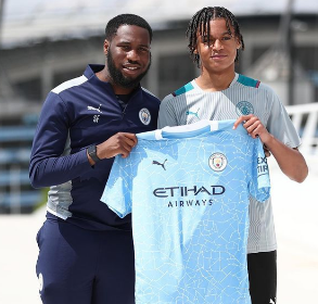 Teenage wonderkid Drake reacts after completing transfer to Manchester City Youth