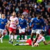 Van Bronckhorst names three Super Eagles stars in Rangers
