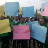 (Photo) Super Falcons Block Entrance To NASS; Arsenal Striker Oshoala Plays Judas