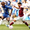 Young defender Alese watches on from the bench as West Ham concede last-minute goal vs Chelsea