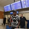 (Photo) Emenike Lands In Athens To Complete Olympiakos Move, To Earn N910M Per Season