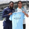 Teenage wonderkid Drake reacts after completing transfer to Manchester City Youth