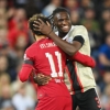 Liverpool 2 Ajax 1 : Bassey faces off with Salah as Matip strikes late to earn Reds victory